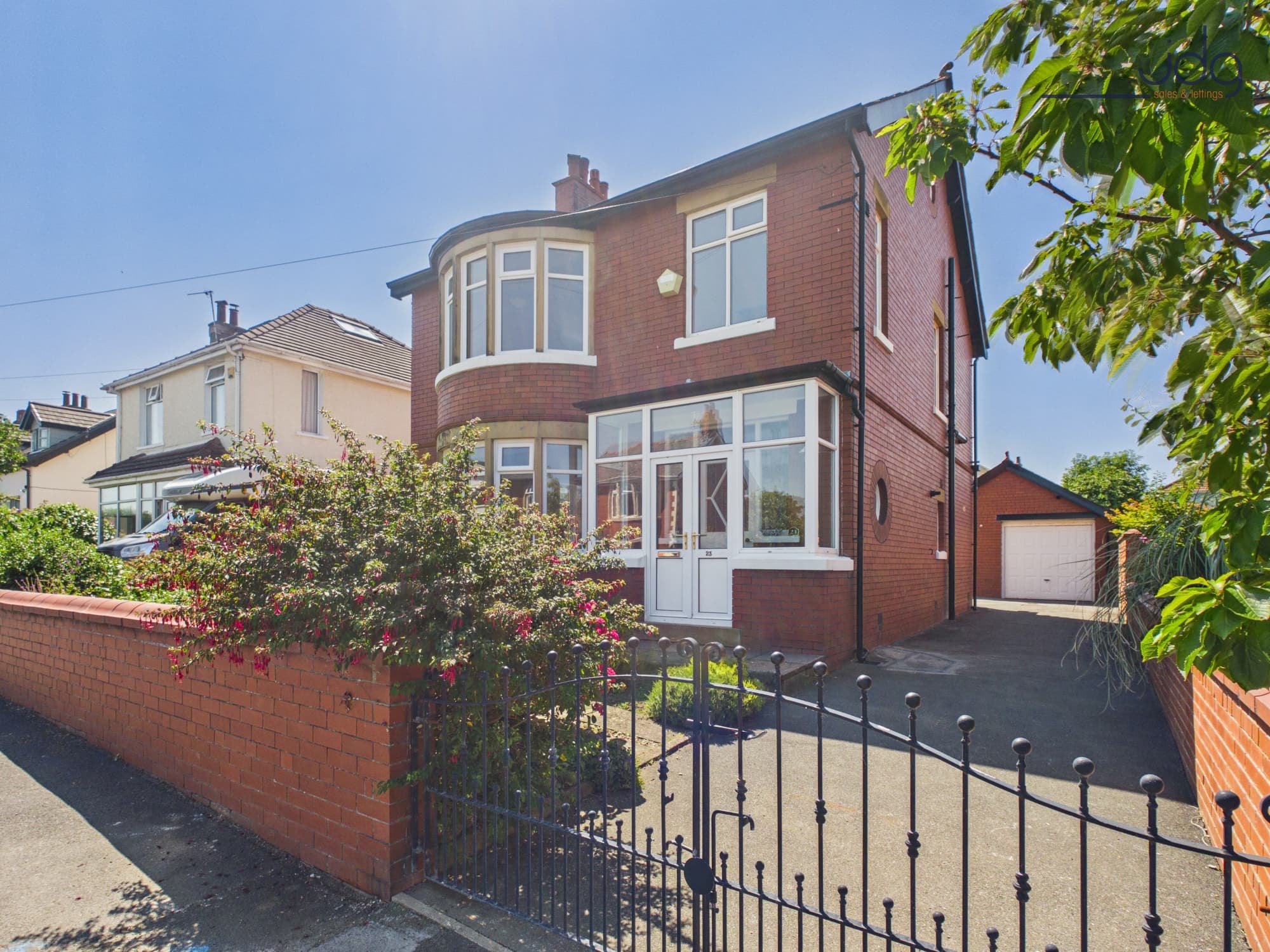 Red-Brick Detached Home With Gated Driveway